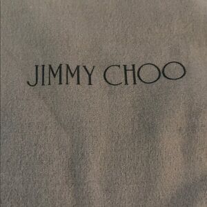Authentic Jimmy Choo dust bag grey fleece for shoe or purse storage.